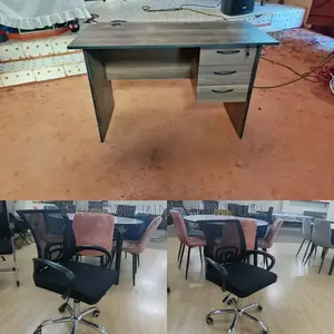 A Modern Wooden Desk With Two Mesh Office Chair