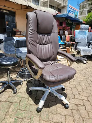 Brown Office Chair With Padded Eames