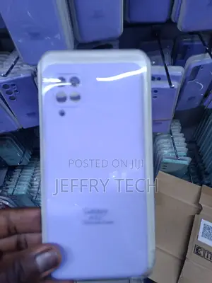 Samsung Galaxy A12 Smartphone in a Light Purple Protective Case.
