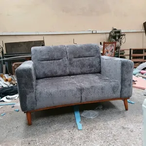 2-Seater Sofa - Quality Fabric Used.