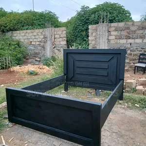 5 by 6 Black Wooden Bed- Free Delivery.
