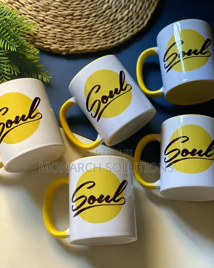 White Mug With Yellow Printed Artwork