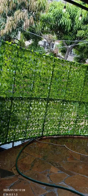 Fresh Green Fence for Cozy Balcony Vibes