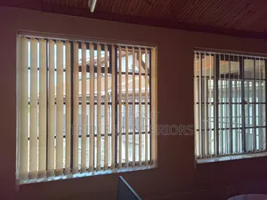Elegant Sun-Filtering Vertical Blinds for Soft Lighting
