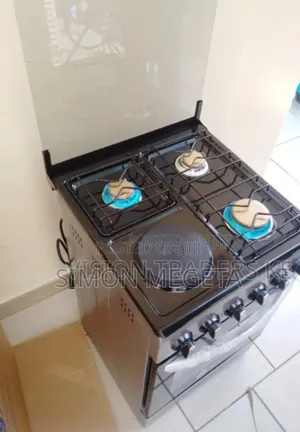3gas Cooker. 1electric Plate Nunix 3+1 Standing Cooker