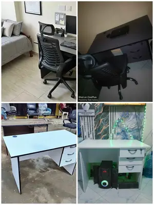 White Desk With Black Trap and Office Chair