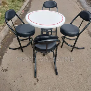Restaurant Table With 4 Black Seats