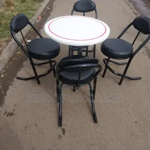 Restaurant Table With 4 Black Seats