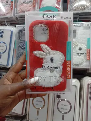iPhone 12 Pro Red Furrywith a White Plush Bunny Adorned With Pearls.
