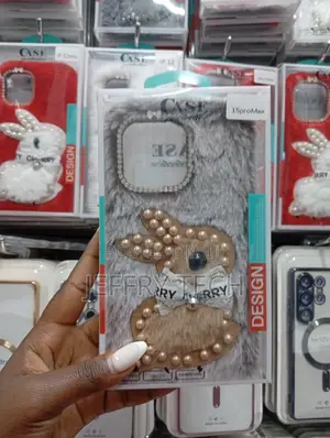 Fluffy Phone Case With a Pearled Is for the iPhone 15 Pro Max.