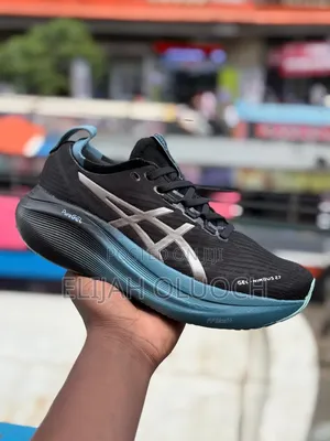 Asics Gel-Nimbus 27 Running Shoe in the Black/Clay Grey