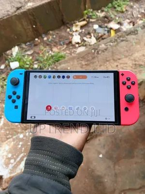 Clean Home Used Nintendo Switch. Red Blue Joycons
