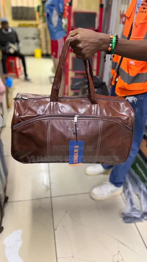 Brown Medium Size Travelling Bag Sleek,Spacious and Quality at 1600