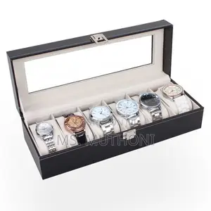 Watch Box Features a Transparent Glass Lid and Velvet-Lined Interior