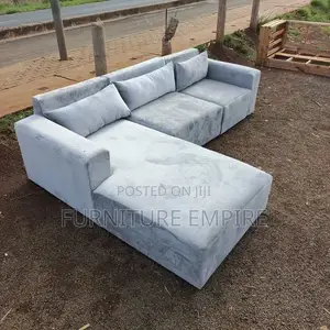 Light Gray L- Shaped Sectional Sofa With Chaise