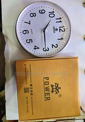 Power Quartz Wifi Wall Clock With a Hidden Security Camera.