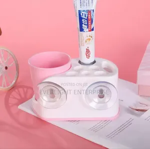 Toothbrush Holder With Toothpaste Dispense
