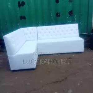 White Couch With Polished Wood Legs
