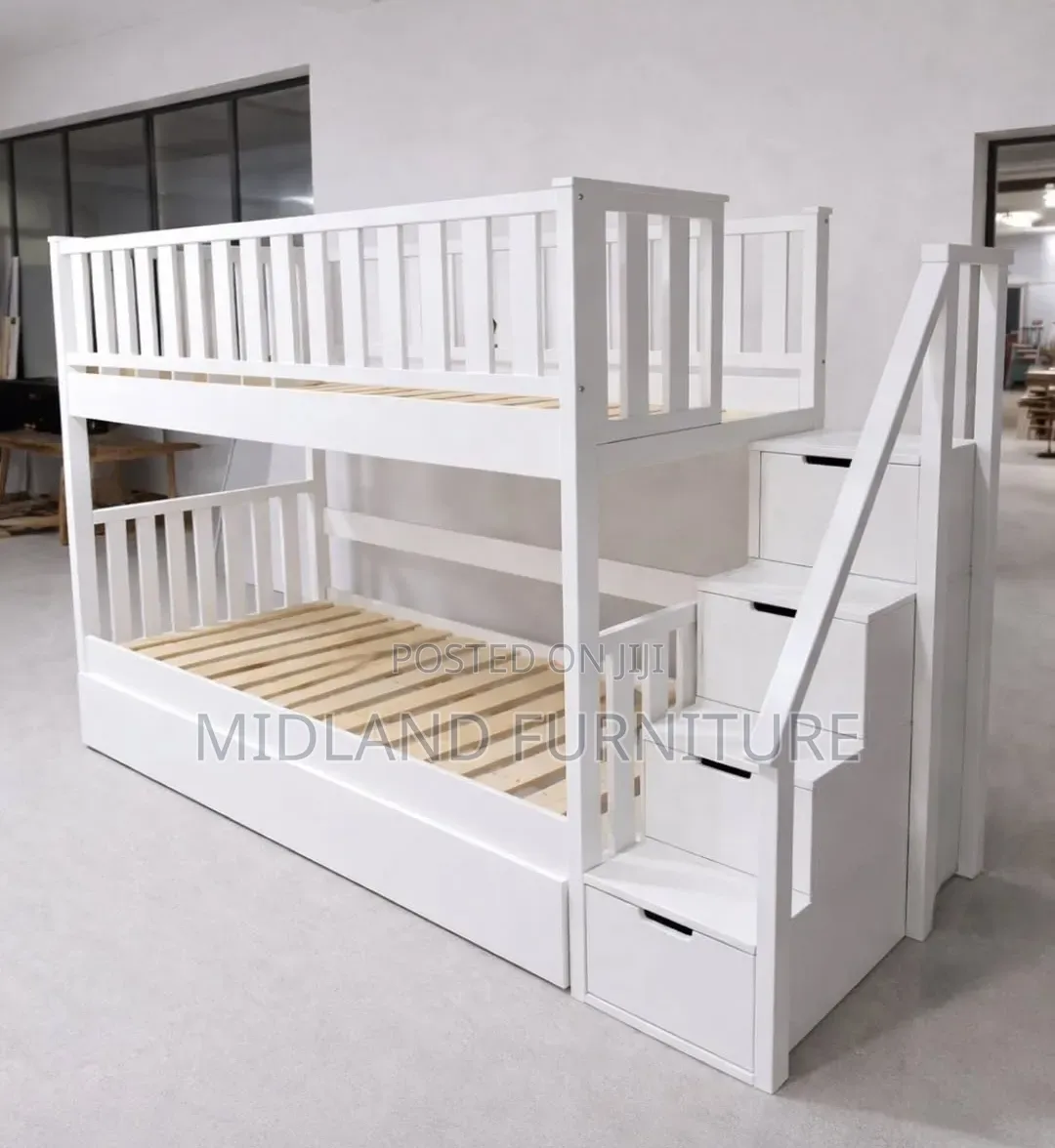 A Double Decker Beds With Stairs Storage Cupboard
