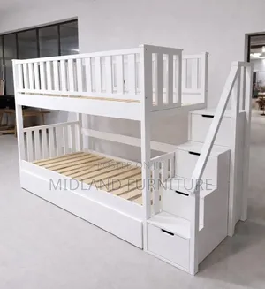 A Double Decker Beds With Stairs Storage Cupboard