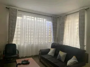 Radiant Curtains and White Sheers for a Refined Living Room Upgrade