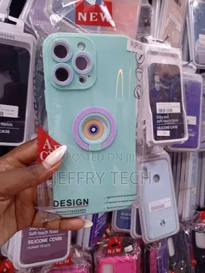 Silicone Phone Case With a Magnetic Ring Holder for iPhone Models.