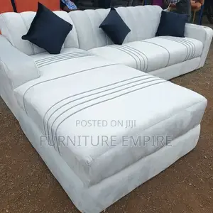 White L- Shaped Sofa With Black Strips
