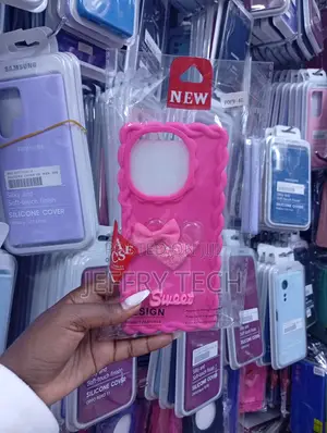 Pink Phone Case Features a Wavy Design, a Heart-Shaped Shaker Pocket