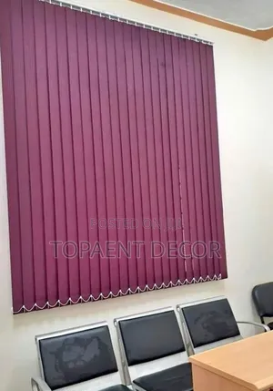 Infinite Light Control With Vertical Maroon Office Blinds