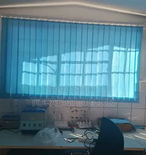 Adjustable Elegance With Light Blue Vertical Office Window Blinds
