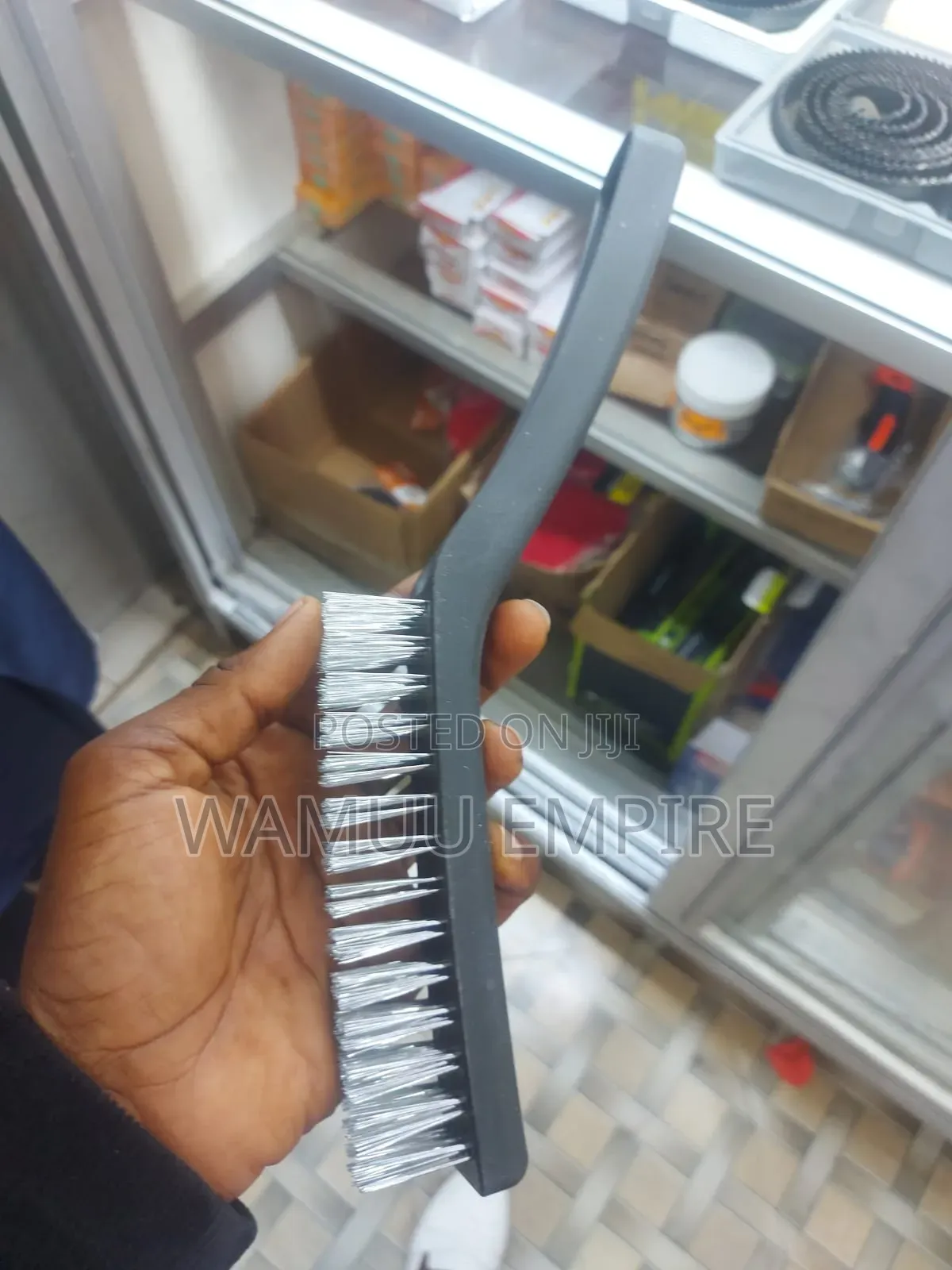 Handheld Wire Brush With a Plastic Handle