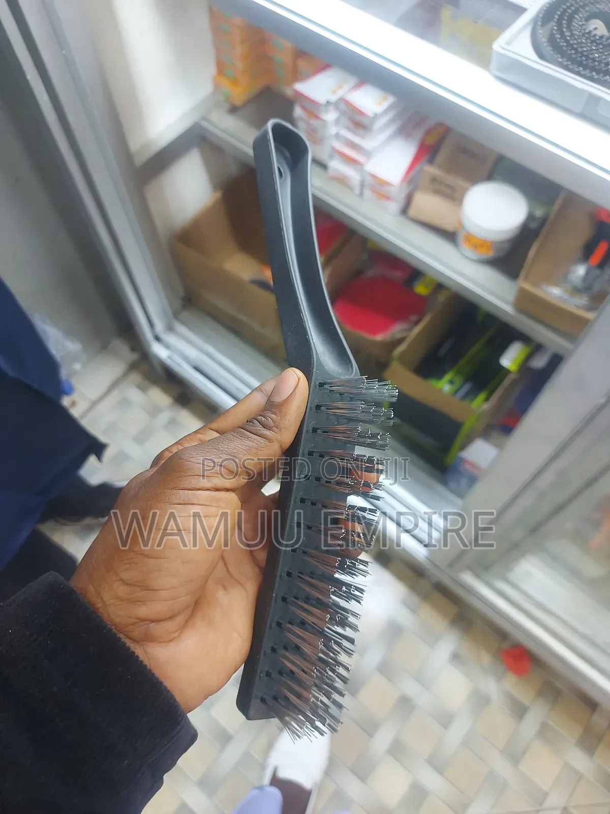 Handheld Wire Brush With a Plastic Handle