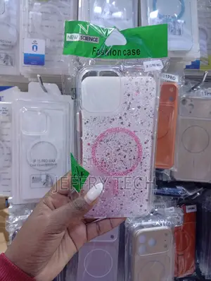 Clear Phone Case Filled With Glitter and Featuring a Magnetic Ring,