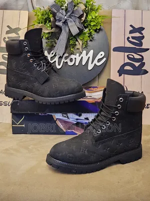 Timberland Lv and Supreme Boots