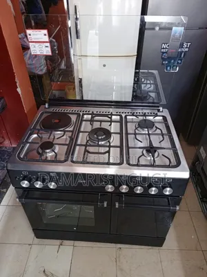 Mika 60 by 90cm Electric Cooker (1 Electric,4 Gases )