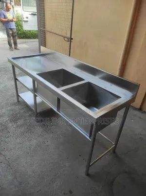 Customized Select Double Sink With Undeshelves