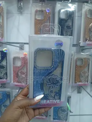 iPhone 15 Pro,Featuring Rhinestones and Floral Designs Case