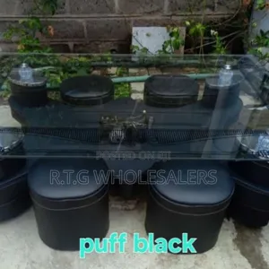 Modern Glass Table Set With Cushioned Puff Stools