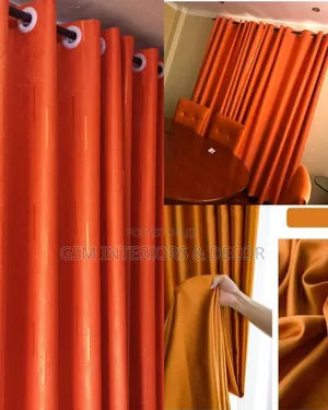 Orange and Gold Curtains Blended With White Sheers