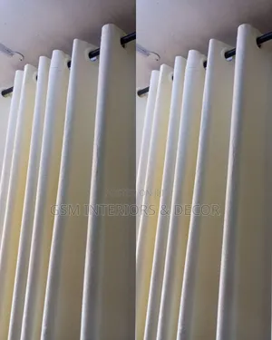 Cream-White Curtains for Homes With Silver Rings