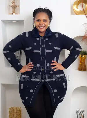 Patterned Long-Sleeved Cardigan With a Fur-Trimmed Collar.