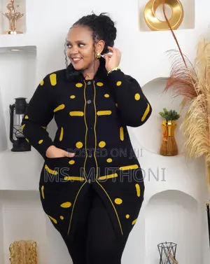 Patterned Long-Sleeved Cardigan With a Fur-Trimmed Collar.
