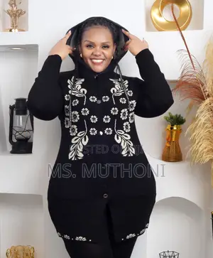 Ladies Knit Cardigan With a Hood and a Beautiful Floral Pattern.