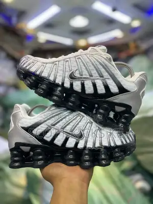 Nike Shox Tl “Metallic Silver Wolf Grey “