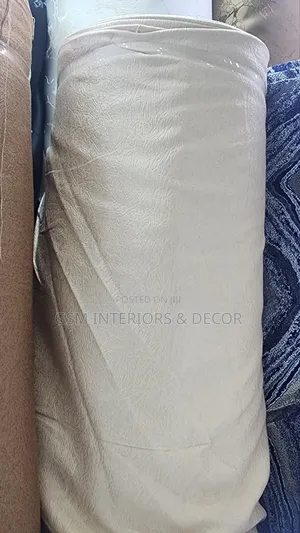 Cream White Curtains in Rolled Up Fabric