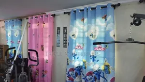 Vibrant Printed Cartoon Drapes for Kids Living Spaces