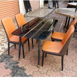 Dinning Set -Black-Effect Table With Two-Tone Orange and Brown Chairs