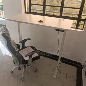 Electric Height -Adjustable Standing Desk With White Top