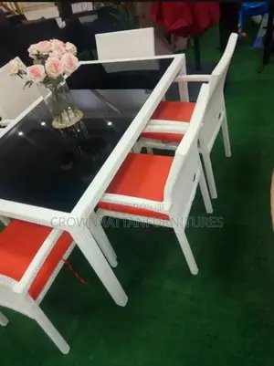 Round Rattan Table With Four Chairs