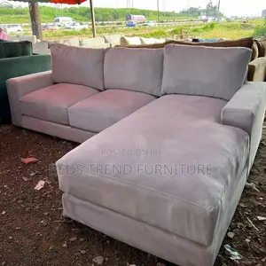 6 Seater Beige L- Seat Sofa.